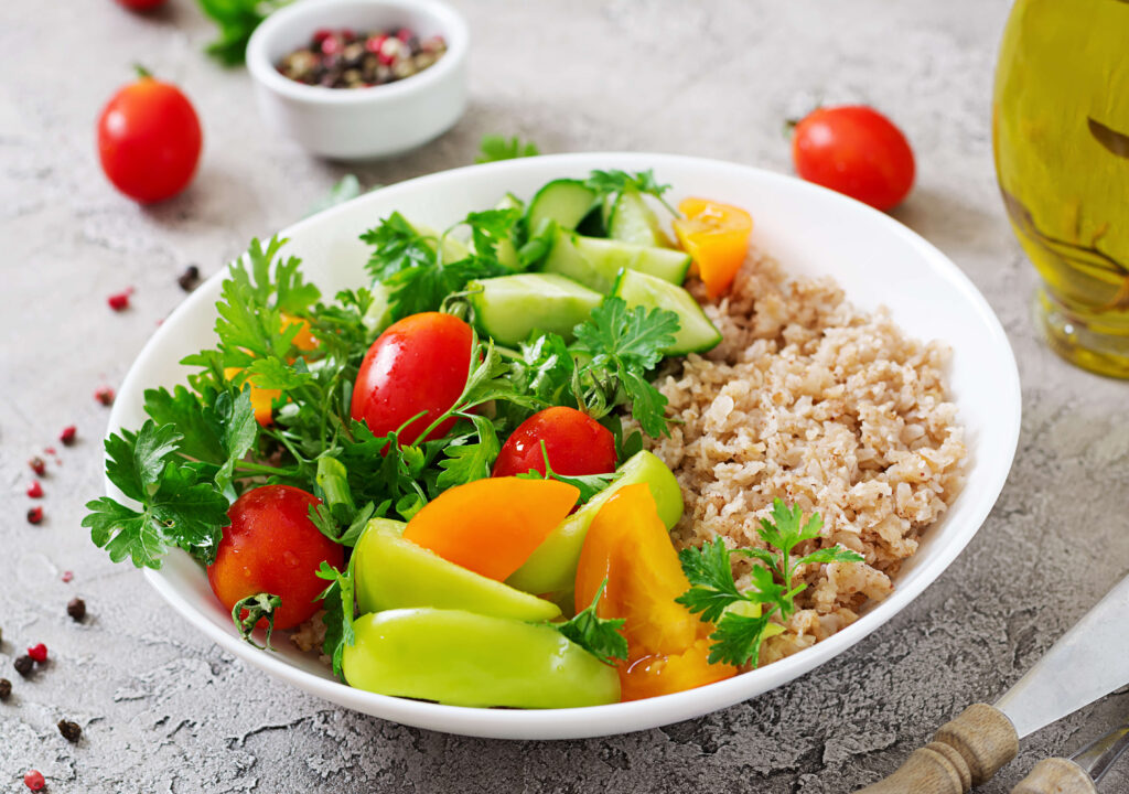 diet-menu-healthy-vegetarian-salad-fresh-vegetables-tomatoes-cucumber-sweet-peppers-porridge-bowl-vegan-food